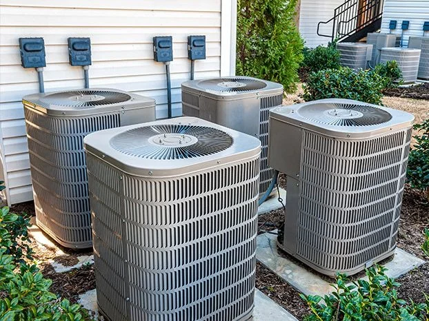 Modern residential air conditioning unit installed outside a home