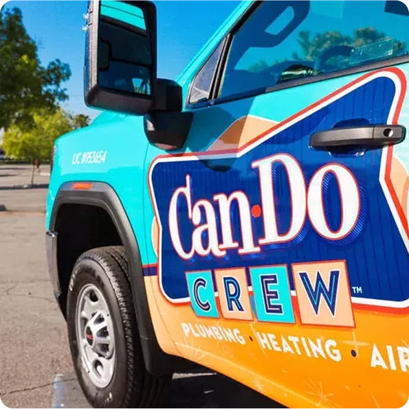 Can Do Crew service vehicle with company branding parked outside a home