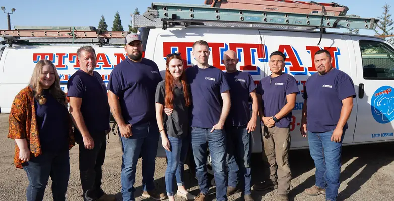 Titan Plumbing team standing together for a group photo