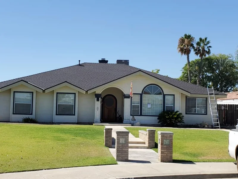 Newly installed asphalt shingle roof on a residential property