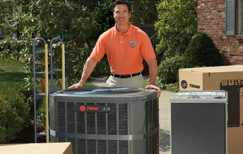 Owner of LaVerne and Son standing next to installed generator