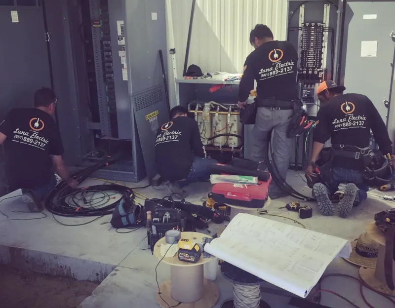 Electrical crew team working together on-site