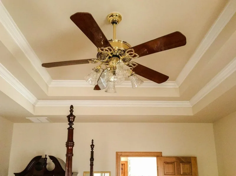 Ceiling fan installation on a residential ceiling